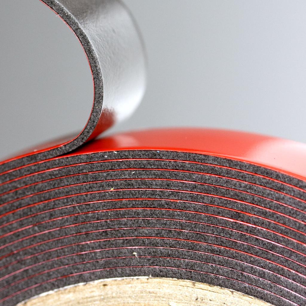 Heavy-duty acrylic foam mounting tape photographed straight on.